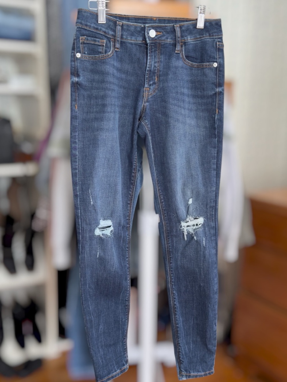 Mid Rise Distressed Skinny Jeans
